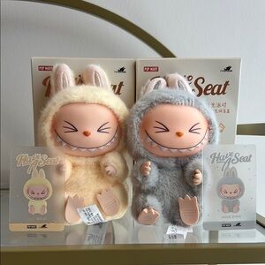 Pop Mart Have a Seat Labubus “Sisi” and “Hehe”